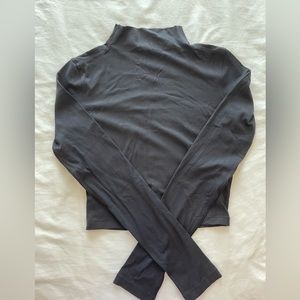 Lululemon All Aligned Mock Neck Long Sleeve shirt. In color black, size 2.